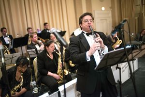 John S. Vishneski III, a partner at Reed Smith and director of the Barristers Big Band, plays the clarinet during the band’s opening set at the 13th annual Barristers Big Band Benefit Ball at the Standard Club. 