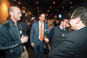 Clark A. Kiesling, Vincent M. Frantz, Benjamin M. Altshul and Roberto Martell Jr. share a laugh at the IIT Chicago-Kent College of Law Young Alumni Spring Social at Theory. About 120 recent graduates attended. 