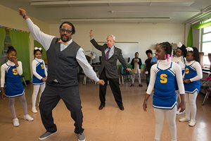 Union League Boys & Girls Clubs Trustee Stephen J. Schlegel dances with members of the ULBGC Stagg Club’s dance team. Club youth participate in the afterschool program at Stagg Elementary in Englewood. Schlegel recently received the prestigious Boys & Girls Club of America’s National Gold Medallion Award recognizing his 39 years volunteering with the organization. 