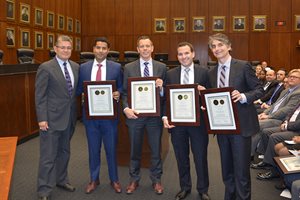 Chief Judge Rubén Castillo (left) presents awards for excellence in pro bono service to (left to right) Karim Basaria, Jeffrey R. Carroll, Benjamin R. Brunner and Daniel M. Greenfield, attorneys at Sidley Austin LLP, at the U.S. District Court for the Northern District of Illinois’ 18th annual Awards for Excellence in Pro Bono and Public Interest Service Ceremony on May 24. 